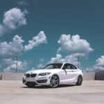 parked white BMW coupe